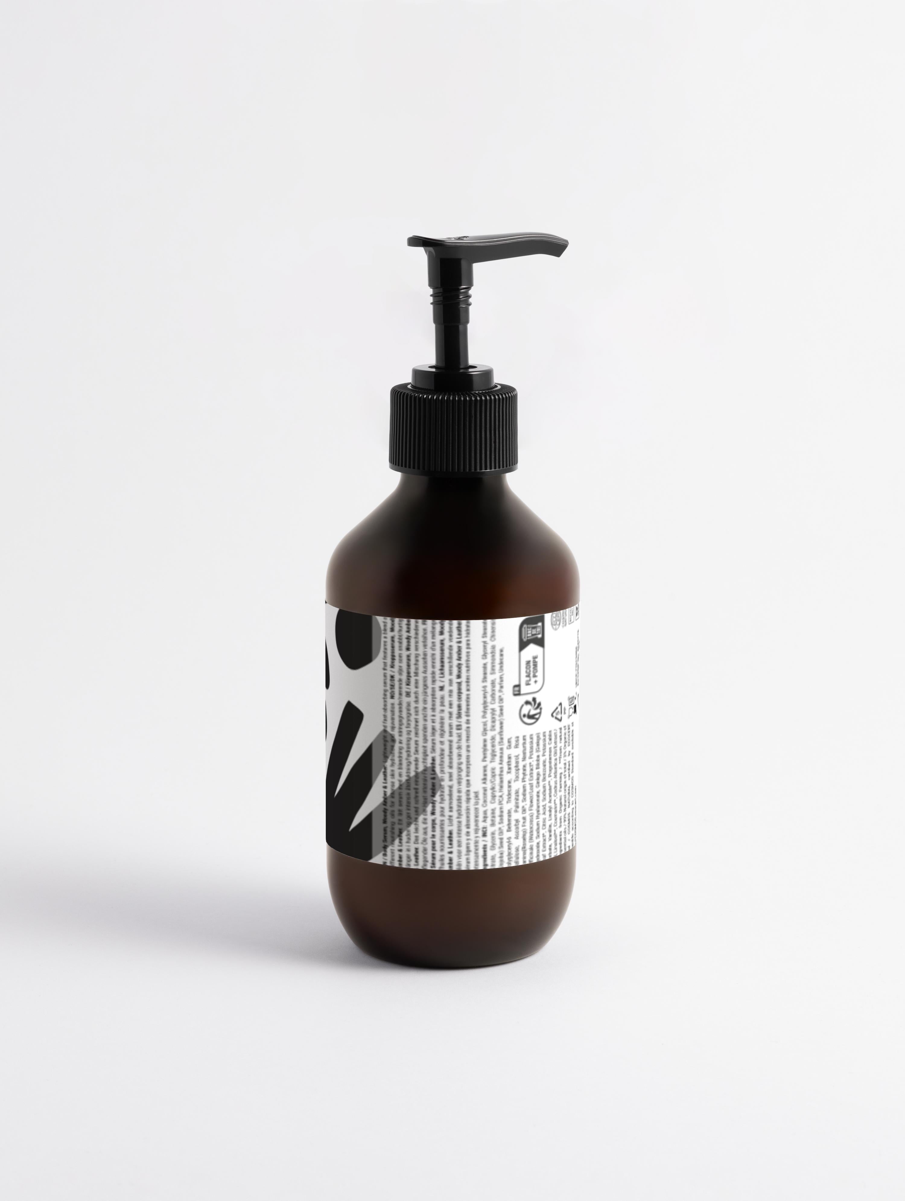 27 Silk Skin Body Serum, Ámbar amaderado y cuero